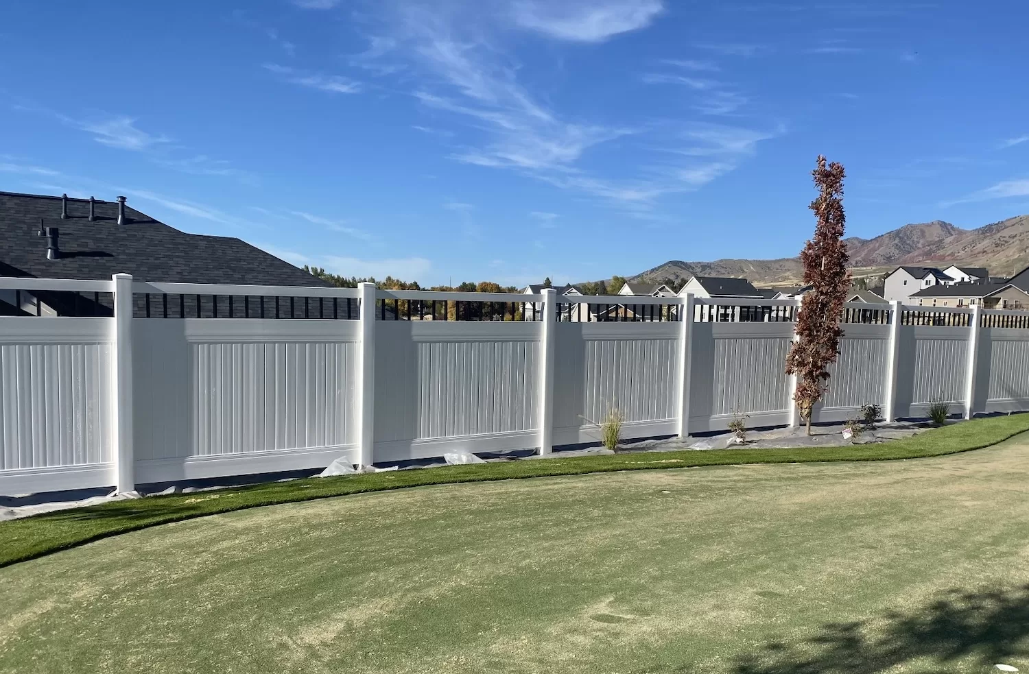 High & Tight Fencing privacy fence with decorative top in North Logan, Utah