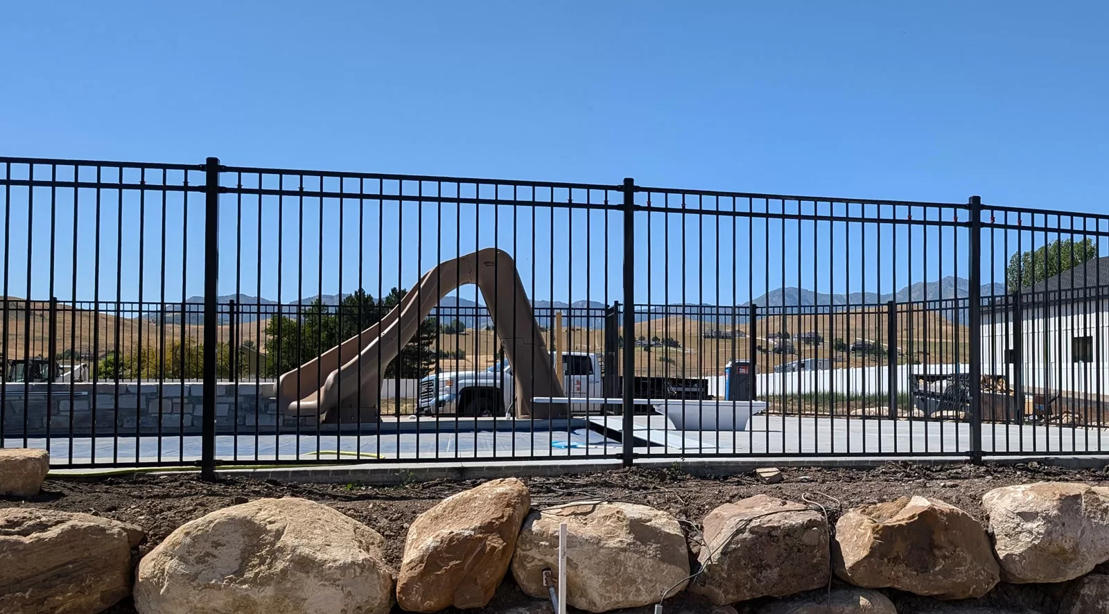6ft ornamental steel fence around a pool with Utah code safety features